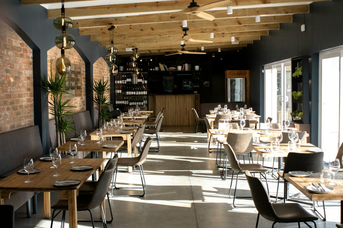 A welcoming restaurant dining room with wooden tables